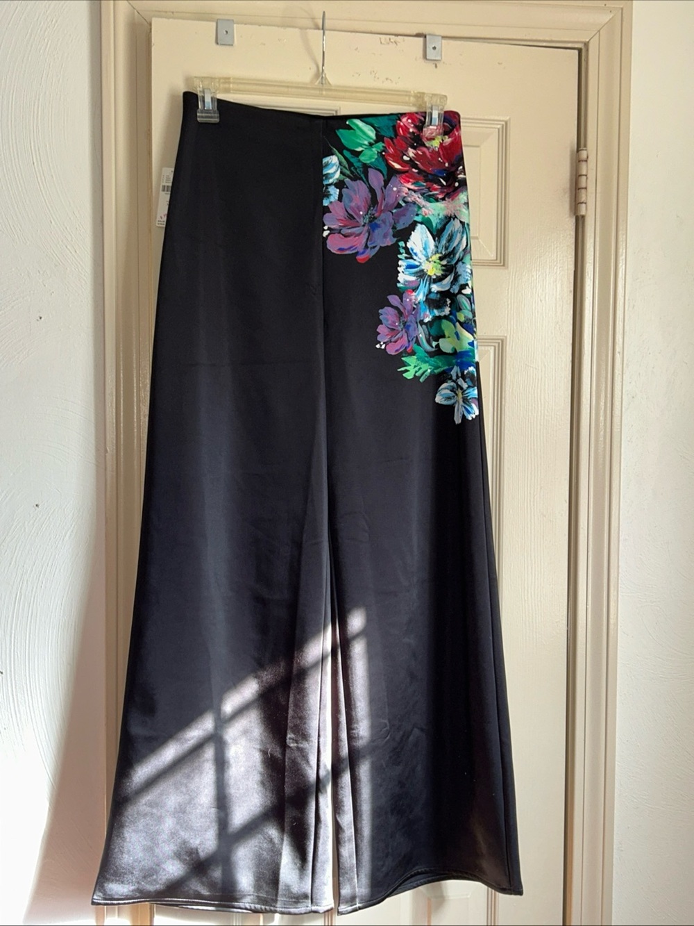 Anthropologie Black Wide-Leg Pants with Multicolor Floral Accent